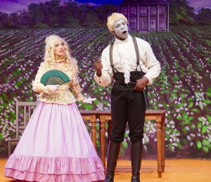 ora (Mallory Newbrough) and plantation owner George (Richard Roberts Jr.) discuss a matter,which obviously concerns the young woman. (Courtesy Area Stages Theatre)