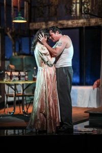 Stella (Elizabeth McCoy) and Stanley Kowalski (Curtis Billings) in Tennessee Williams' "A Streetcar Named Desire." (Photo by Brittany Werner)