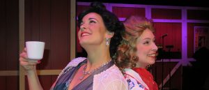 Patsy Cline (Margaret Belton) and Louise Seger (Caroline Fourmy) enjoy coffee in "Always, Patsy Cline." (Photo by Alan Smason)