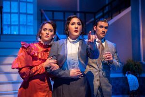 Lucy (Isabella Lopez), Mina (Lindsey Corey) and Jonathan (Daniel Capote) notice something strange in Zoetic Stage's production of the world premiere of Michael McKeever's stage adaptation of Dracula. (Photo by Justin Namon)
