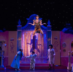 Shelbie Mac as Peter Pan with Bree Hollis, Cayden Pecoraro and Ethan Rogers as the Darling children Wendy, Michael and John. (Photo by John Barrois)