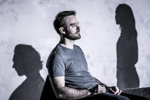 Charlie Cox with the shadows of Tom Hiddleston, left, and Zawe Ashton. (Photo by Marc Brenner)