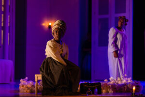 Tameka Bob as the slave girl Makeda, left, with Troi Bechet (Beartrice) at rear.