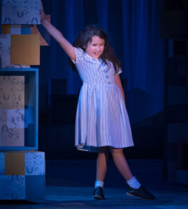 Pint-sized Blake Bosley as one of two Matilda Wormwoods to play the title role. (Photo by John Basrrois)