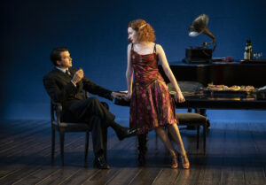 Otto, the banker, meets the full-of-life Hermine. (Photo by Joan Marcus)