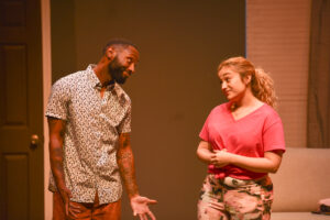 Jay Dorsey, left, and JC Domangue play Wayne and Maggie, a modern set of new parents. (Photo by Jessica Mixon)