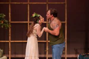 Yvette Boureois (Nina) with Cody Evans (Spike) in the Crescent City Stage production of "Vanya and Sonia and Masha and Spike." (Photo by Brittney Werner)