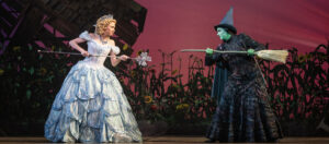 Glinda (Celia Hottenstein) spars with Elphaba (Olivia Valli) in "Wicked." (Photo by Joan Marcus)