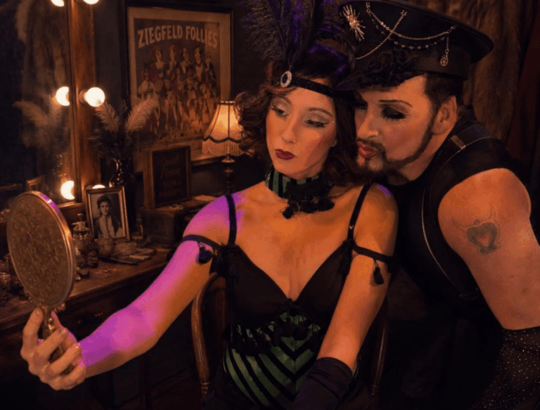 Welcome to the Kit Kat Klub—Where the Party Masks a Gathering Storm